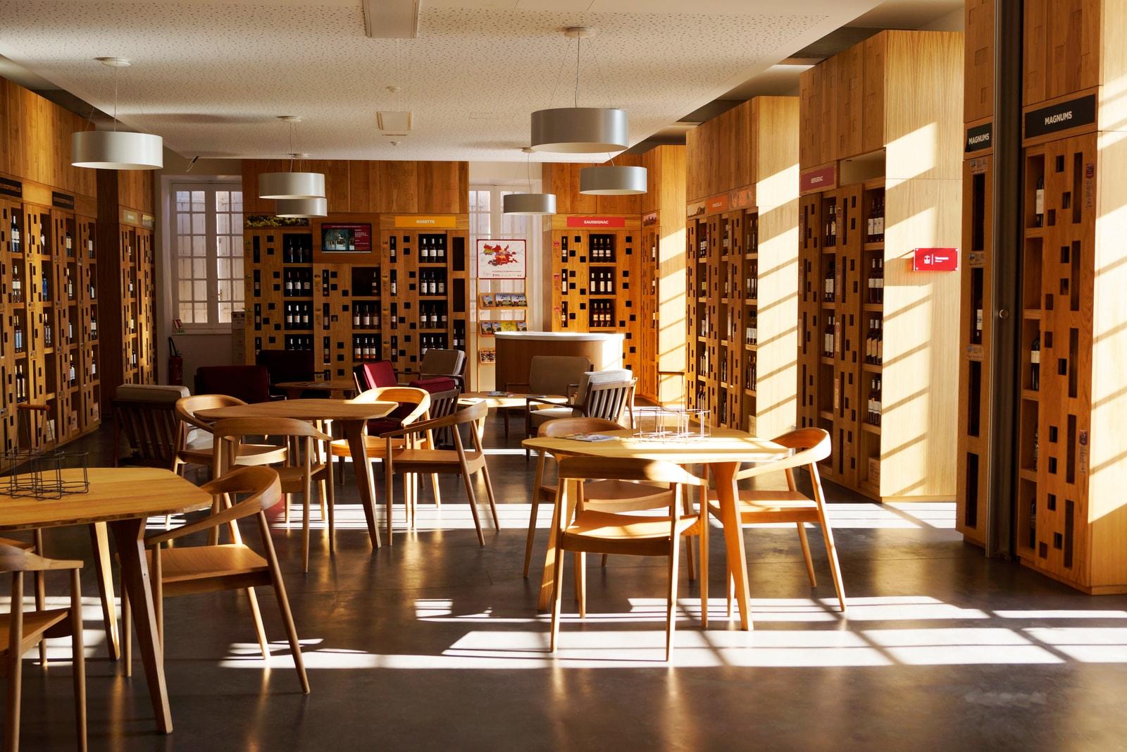 Wine displays and tasting tables inside Quai Cyrano in Bergerac
